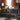 Moderne bureaulamp, wit, Nelson design, naast houten bureau met stoel, retro interieur.