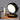 Zwarte tafellamp met ronde kap, moderne designlamp, sfeerverlichting, op houten tafel.