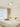 Beige plafondlamp in moderne slaapkamer, Scandinavisch design, minimalistisch interieur.