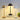 Drie moderne tafellampen in goud, zwart en wit op boeken, sfeerverlichting, minimalistisch design.