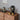 Duiker tafellamp zwart, goud, modern design, decoratief, houten dressoir, sfeerverlichting.