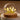 Glazen bol tafellamp met gele bloemen, houten basis, sfeerverlichting, decoratief interieur.