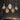Glazen hanglampen met LED-verlichting boven marmeren tafel, modern design.