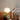 Hanglamp wit glas modern design slaapkamerinterieur verlichting boven nachtkastje.