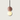Moderne hanglamp met roze terrazzo en witte bol, minimalistisch design, interieurverlichting.