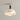 Moderne plafondlamp, beige, golvende kap, chroom details, eigentijds interieurontwerp.