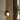 Houten wandlamp met gebogen design, moderne verlichting, warm licht, interieurdecoratie.