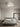 Moderne witte plafondlamp in minimalistische slaapkamer, elegant interieurontwerp.