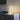Moderne houten tafellamp met LED-verlichting op marmeren tafel, minimalistisch design.