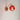 Moderne LED wandlamp, rood glazen bol, messing armatuur, minimalistisch design, slaapkamer.