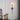 Zwarte ijzeren LED-wandlamp met glazen bol, modern design voor woonkamer of slaapkamer.