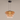 Moderne hanglamp, amberkleurig glas, ronde vorm, minimalistisch design, plafondverlichting.