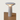 Witte LED tafellamp, modern design, cilindrische basis, sfeerverlichting, minimalistisch.