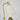 Gouden tafellamp met golvende glazen kap, vintage stijl, elegante verlichting, interieurdecoratie.