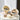 Twee beige keramische opbergschalen met make-up op tafel, moderne decoratie.