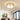 Moderne plafondlamp, goudkleurig, glazen kap, woonkamerverlichting, elegant design.