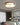 Moderne ronde plafondlamp, goud en wit, slaapkamerverlichting, elegant design.
