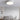 Grijze plafondlamp in moderne slaapkamer, minimalistisch design, energiezuinige verlichting.