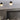 Moderne zwarte plafondlampen in keuken, LED-verlichting, minimalistisch design, energiezuinig.