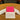Roze leren kaarthouder op houten tafel, stijlvolle portemonnee, minimalistisch ontwerp.