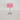 Roze tafellamp met chromen voet, modern design, glazen kap, interieurverlichting.