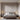 Moderne slaapkamer met beige bed, hanglampen, nachtkastjes en minimalistisch interieurontwerp.