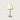 Klassieke tafellamp met witte stoffen kap en metalen voet, geschikt voor woonkamerverlichting.