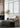 Moderne tafellamp zwart metaal, minimalistisch design, woonkamer decor, natuurlijk licht.