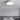 Grijze plafondlamp in moderne slaapkamer, ronde vorm, minimalistisch design.