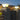 Twee moderne buitenlampen op hek, LED-verlichting, energiezuinig, warm wit licht, tuinverlichting.