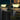 Tuinverlichting op pilaren, moderne LED-lampen, warm wit licht, buitengebruik.